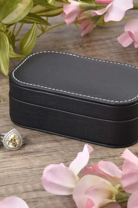 Black Faux Leather Oval Travel Jewelry Box - Image 1
